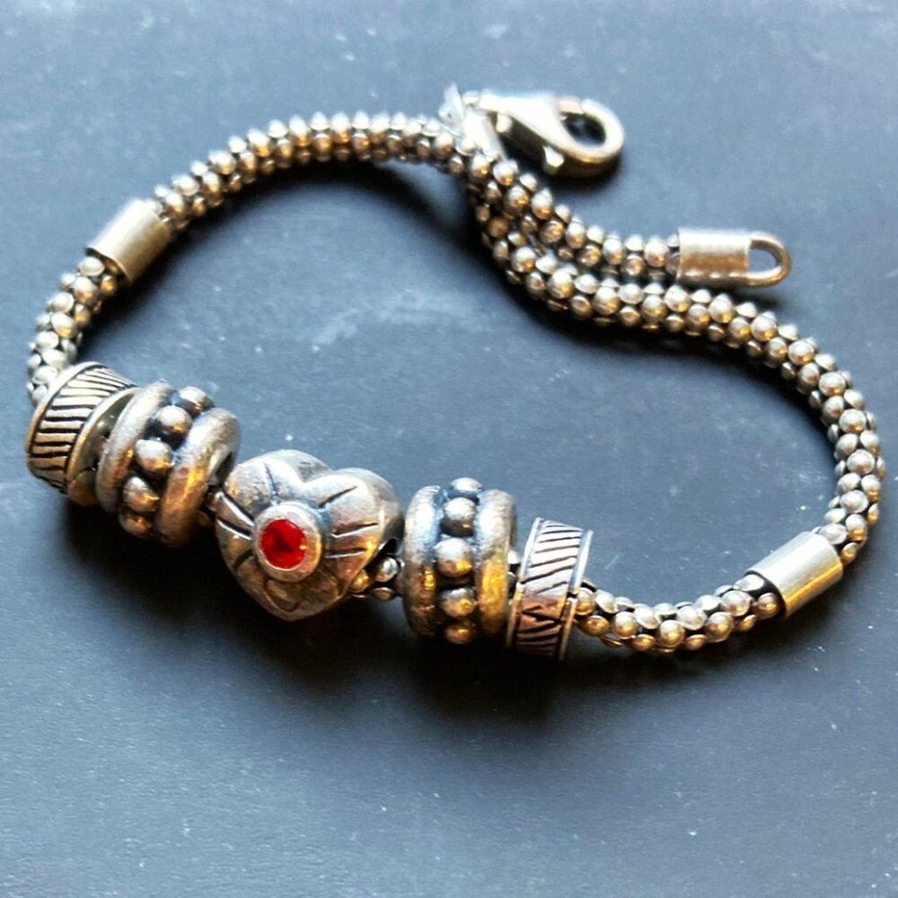 Signed Italian charm bracelet in sterling silver
